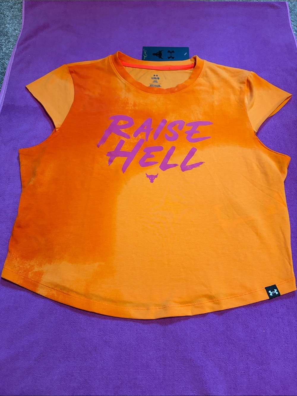 NWT 🧡 Under Armour Orange & Purple "Raise Hell" Cap Sleeve Tee “The Rock”